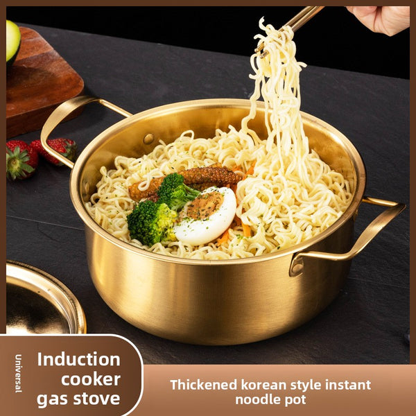 Stainless steel ramen pot with lid and chopsticks and spoons