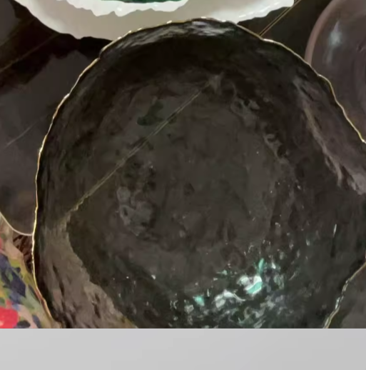 Irregular transparent colored glass bowl